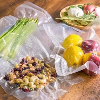 O aferidor feito sob encomenda do vácuo da cozinha ensaca o plástico do armazenamento do alimento do GV